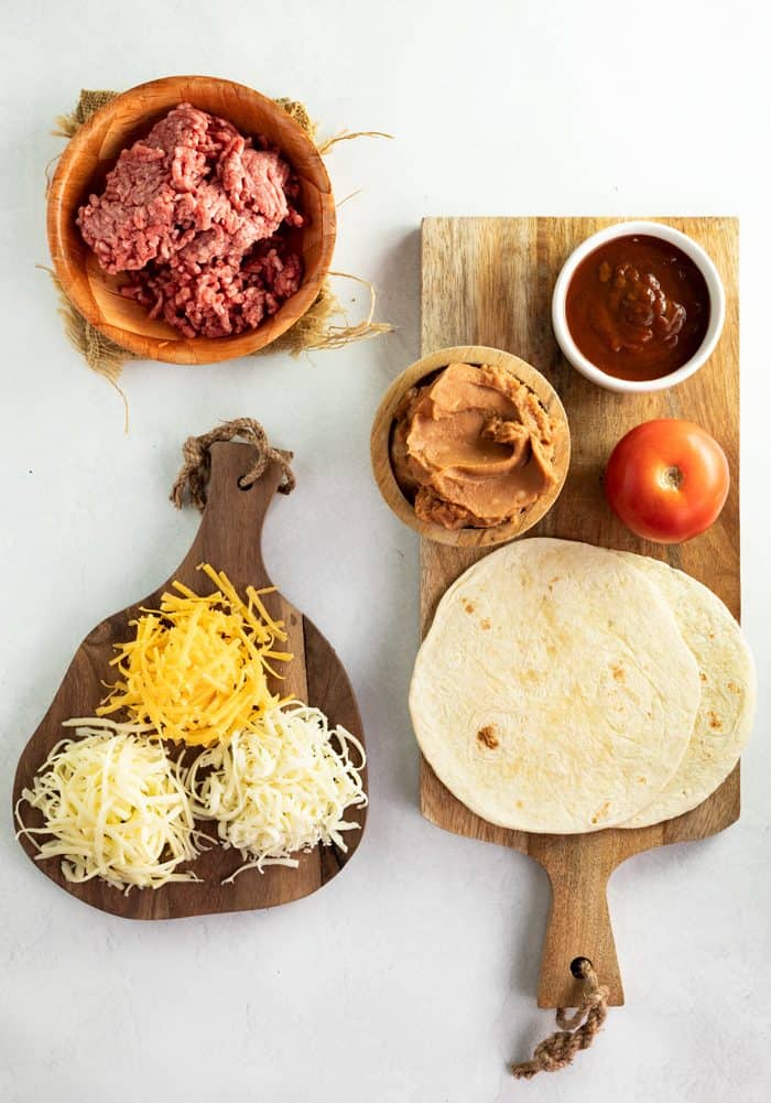 Overhead shot of ingredients needed for Taco Bell Mexican Pizza