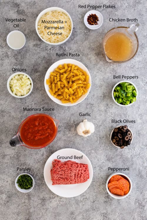 Overhead view of ingredients needed to make pizza pasta