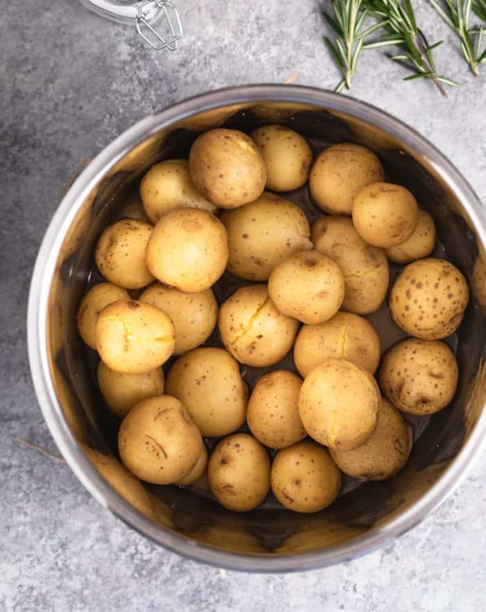 An instant pot full of potatoes that have been pressure cooked.