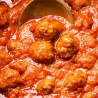 A Slow Cooker full of Meatballs and Marinara sauce