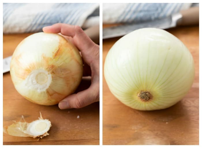 An image of an onion with the stem being cut and skin being peeled to make homemade onion rings.