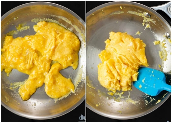 Scrambled eggs that are almost cooked through.