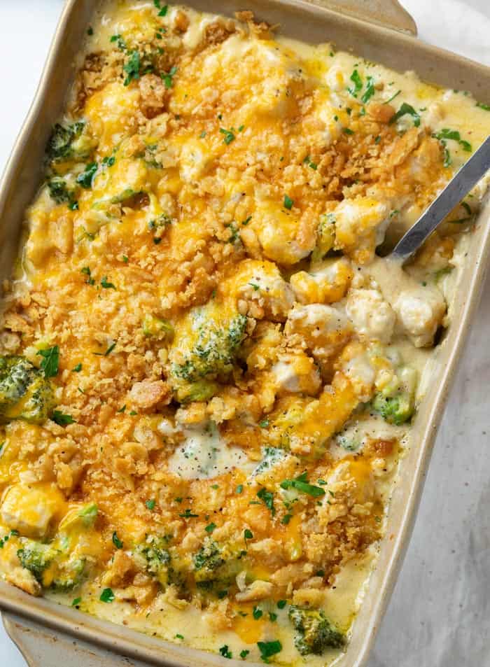 A casserole dish filled with creamy Chicken Divan with Broccoli topped with Ritz Crackers