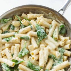 A labeled image of Creamy Spinach Pasta in a skillet.