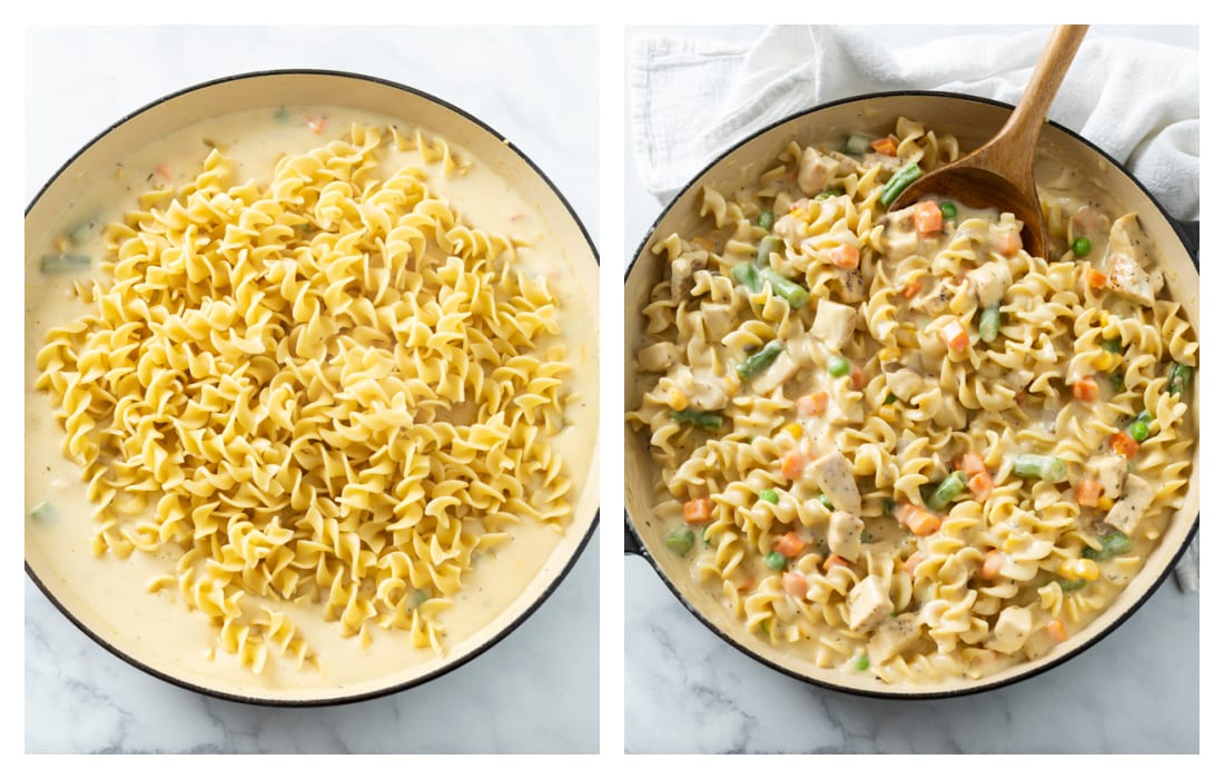 Adding egg noodles to a creamy cheese sauce with vegetables.