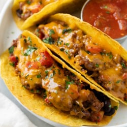 Mexican inspired recipe of Baked Tacos on a plate.