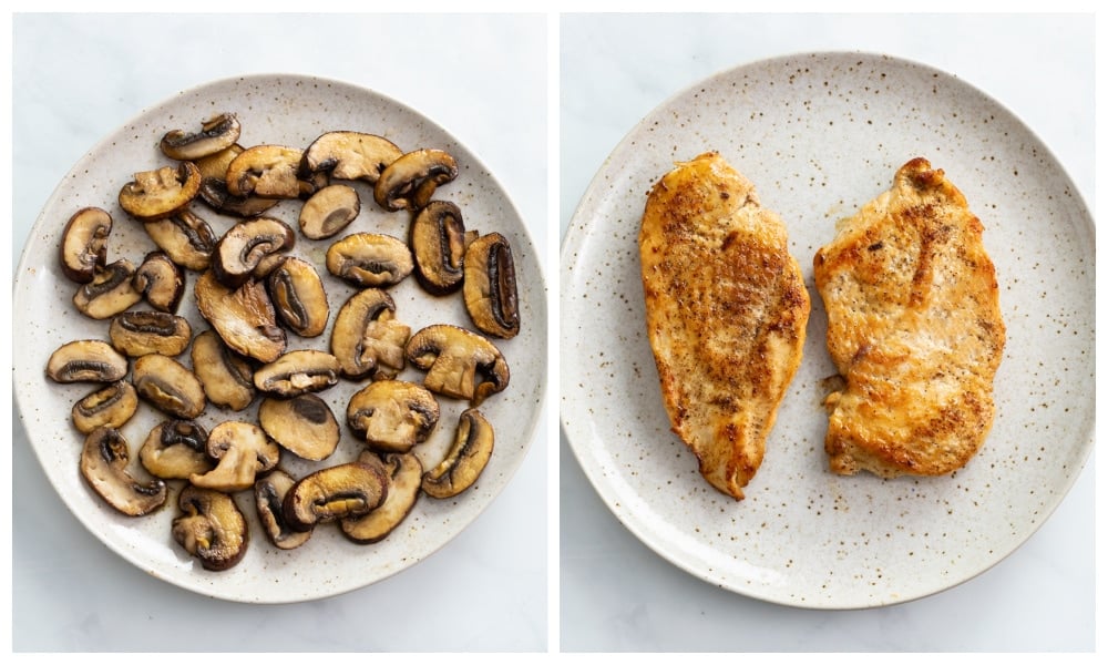A plate of cooked mushrooms next to a plate of cooked chicken breast.