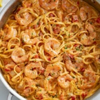 Shrimp Pasta in a creamy sauce with linguine and diced tomatoes.