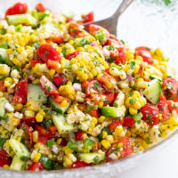 Corn Salad with a Mexican dressing tossed with vegetables and cilantro.