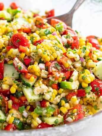 Corn Salad with a Mexican dressing tossed with vegetables and cilantro.