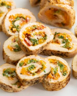 Slices of Chicken Roulade filled with Cheese, Broccoli, and Bacon.