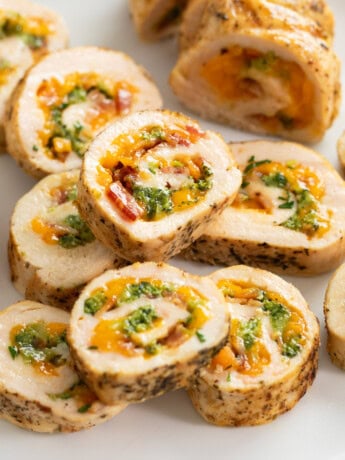 Slices of Chicken Roulade filled with Cheese, Broccoli, and Bacon.