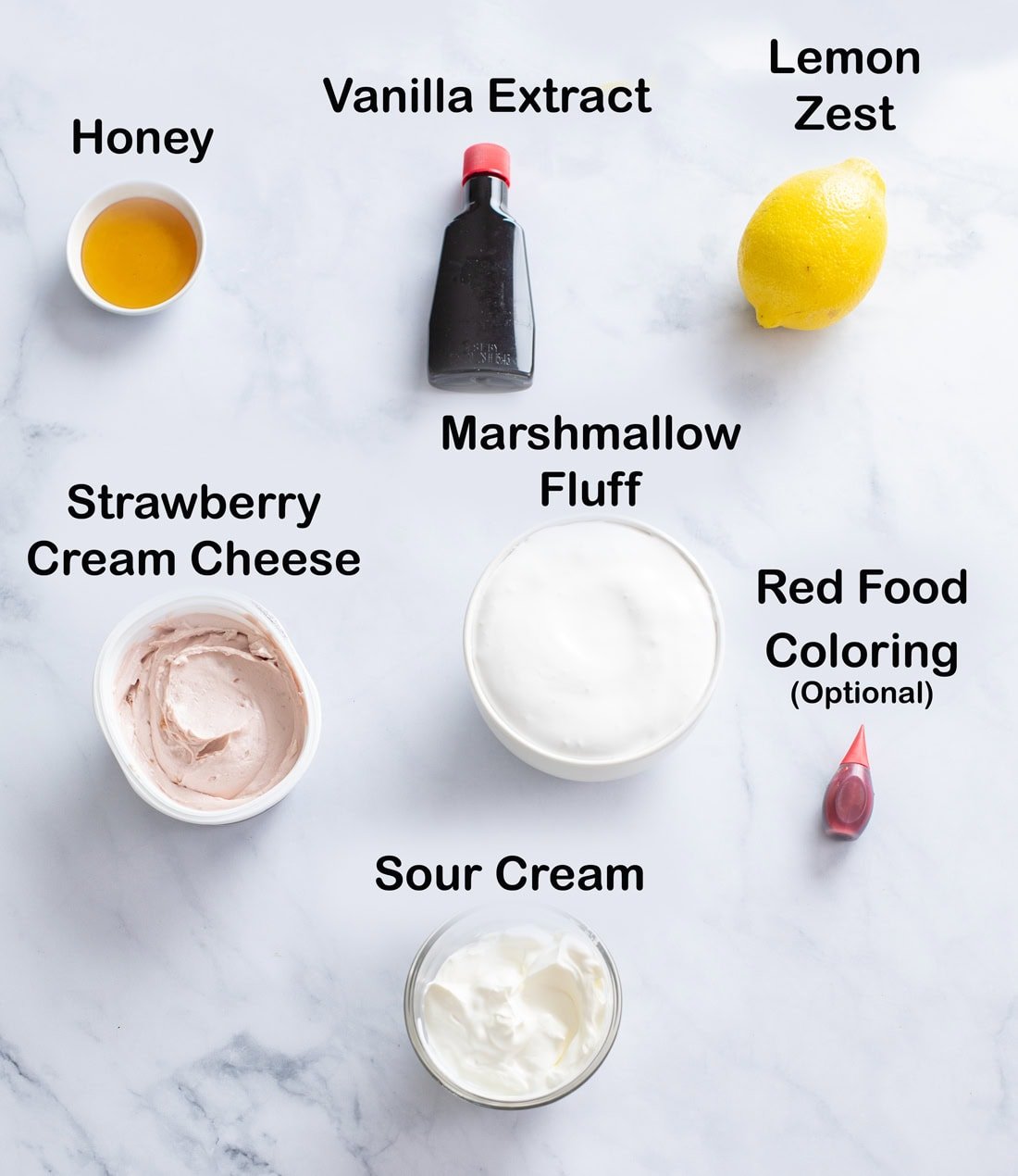 Ingredients for Fruit Dip on a white surface with labels.