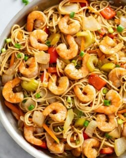 Shrimp Lo Mein in a skillet with vegetables, noodles, and sauce.