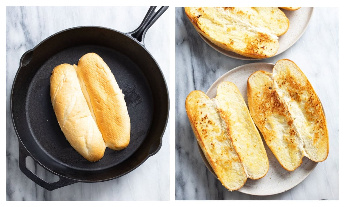 A hoagie roll being toasted in a cast iron skillet next to a plate of toasted rolls.