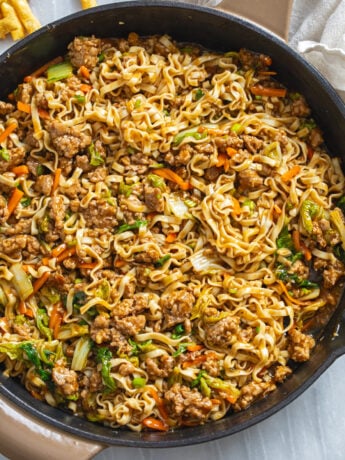 Pork Noodles with carrots and cabbage tossed in a homemade peanut sauce.