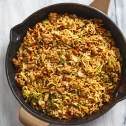 Pork Noodles in a skillet with ground pork, vegetables, and homemade stir fry sauce.